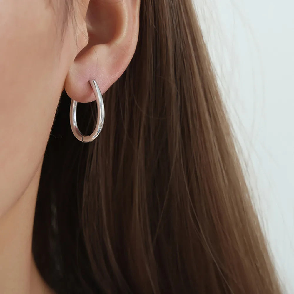 The Aurora Drop Huggie Earrings