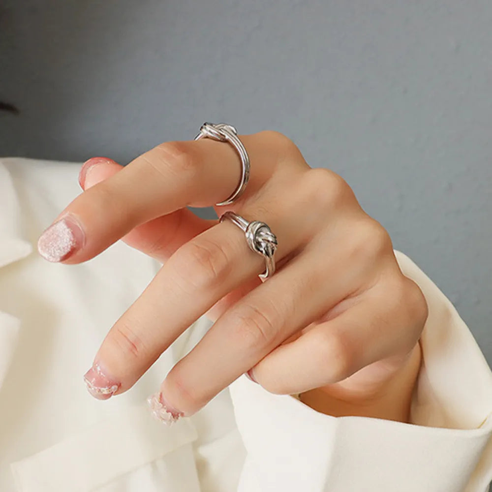 The Nexus Knot Ring