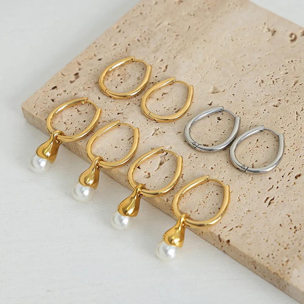 The Aurora Drop Huggie Earrings